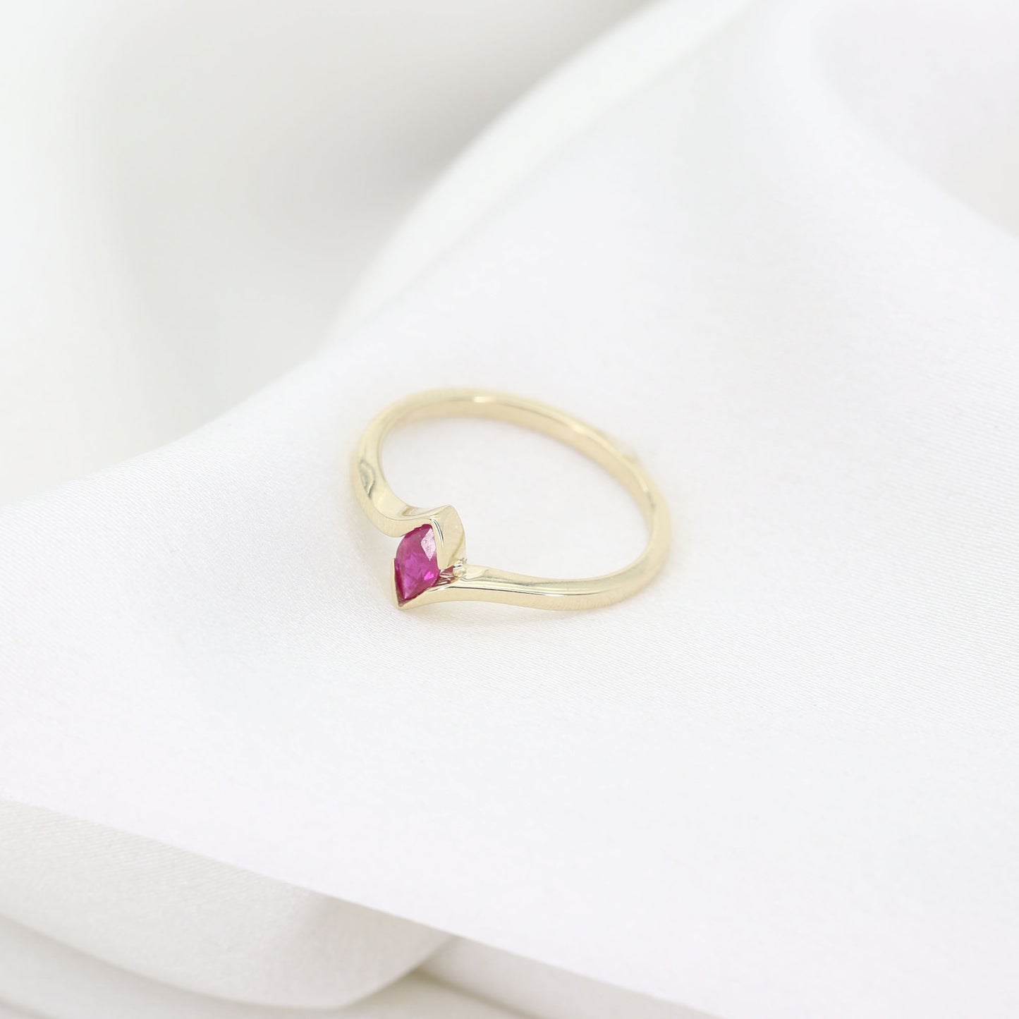 14K MARQUISE RUBY BEZEL BAND