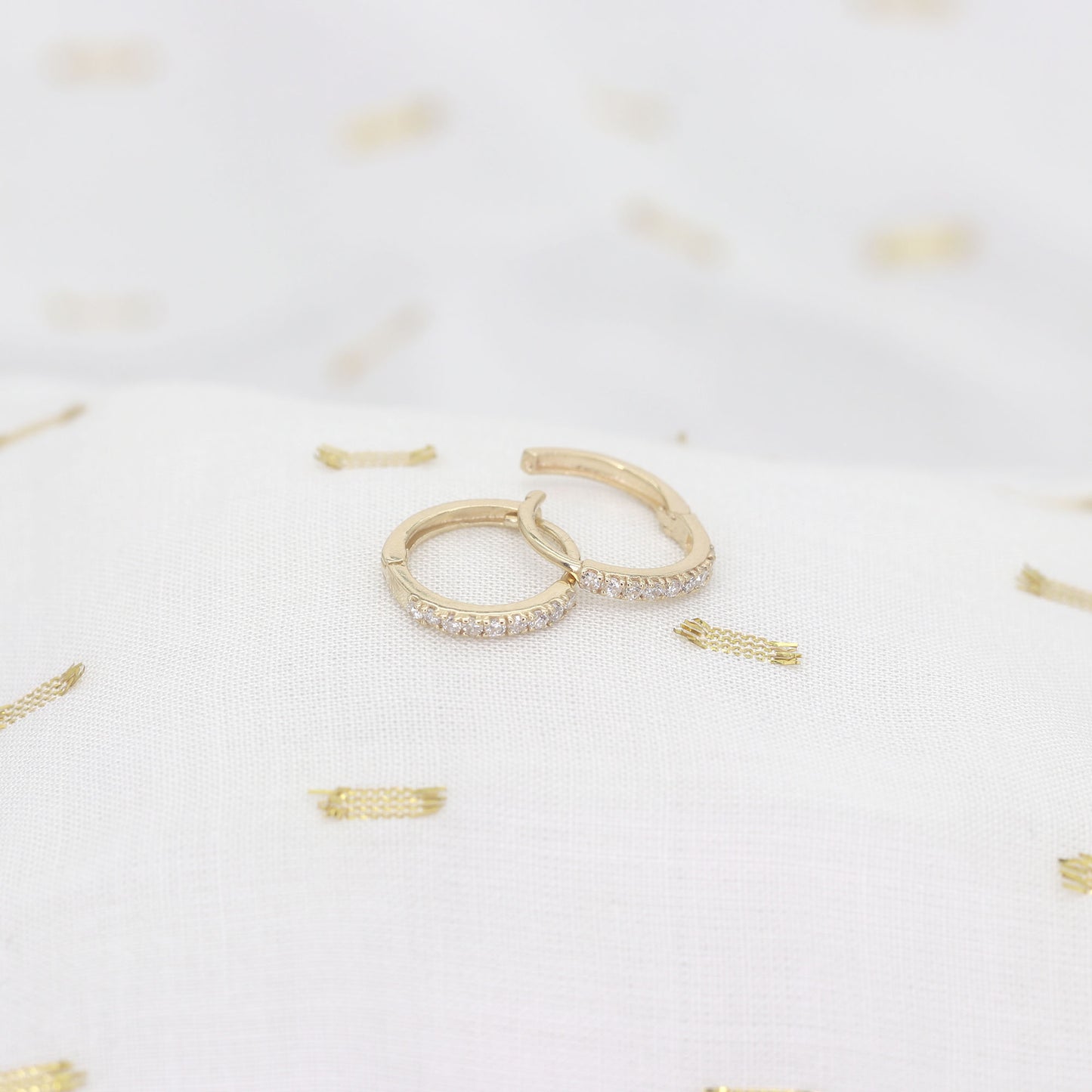 14k 9 DIAMOND TINY HOOP EARRING