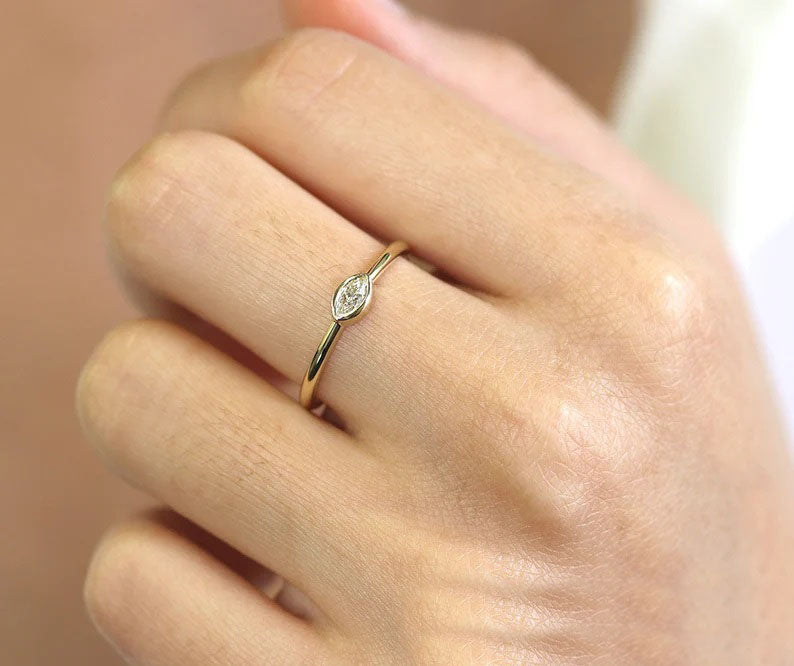 14K MARQUISE DIAMOND BEZEL SOLITAIRE RING