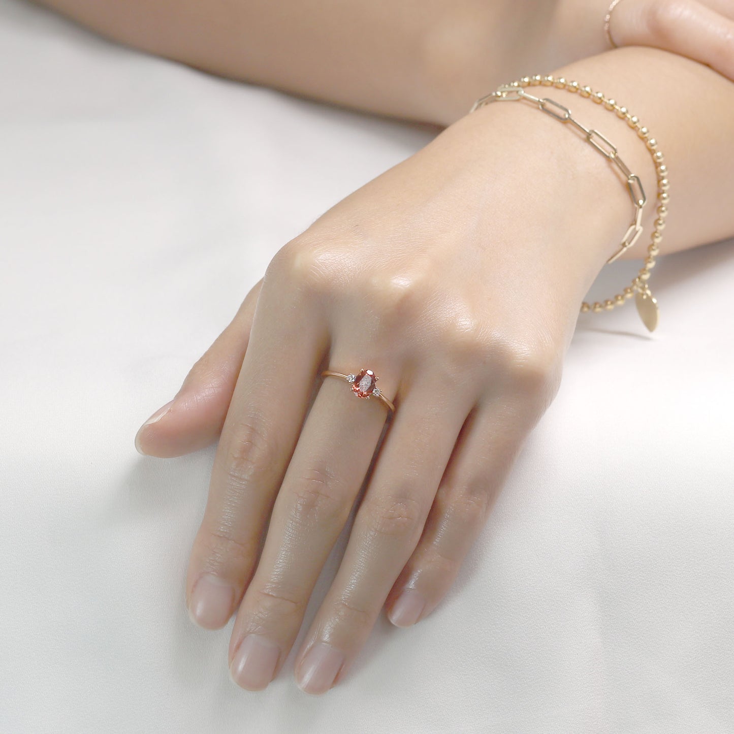14K OVAL SUNSTONE DIAMOND RING