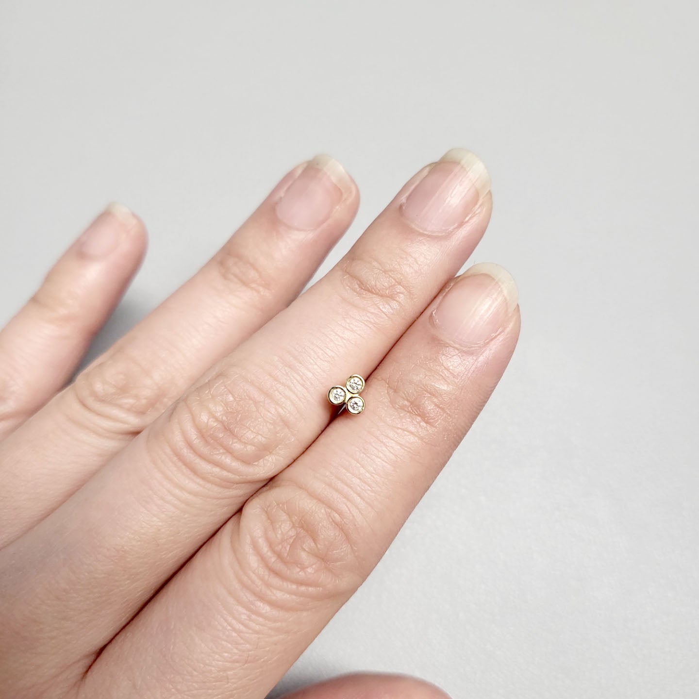 14K DIAMOND BEZEL TINY STUD EARRING