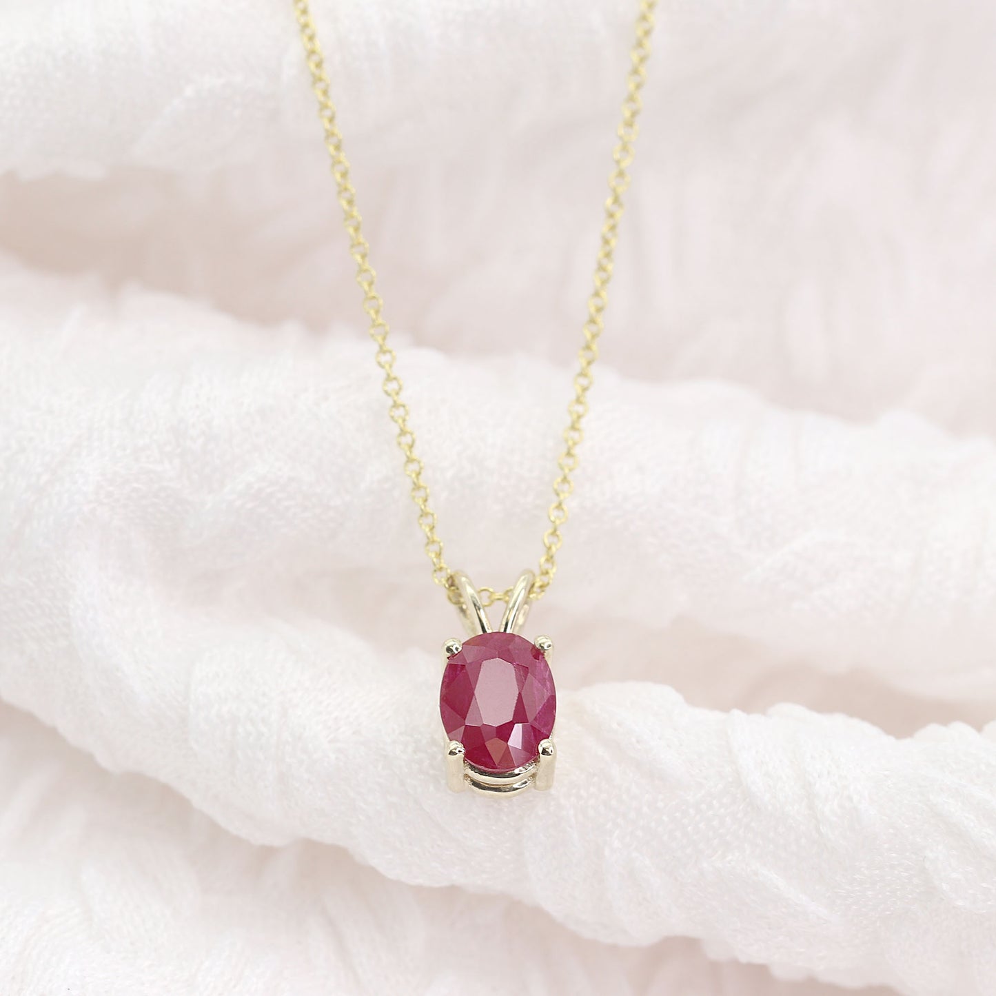 14K OVAL RUBY SOLITAIRE NECKLACE