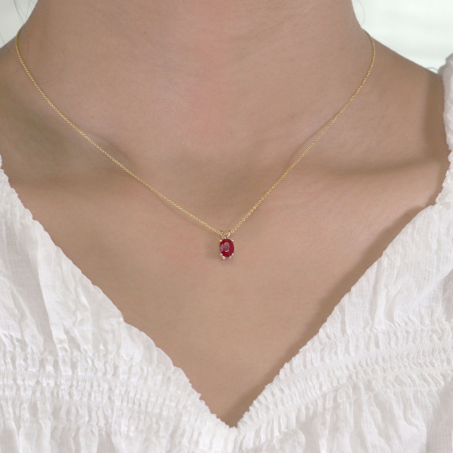 14K OVAL RUBY SOLITAIRE NECKLACE