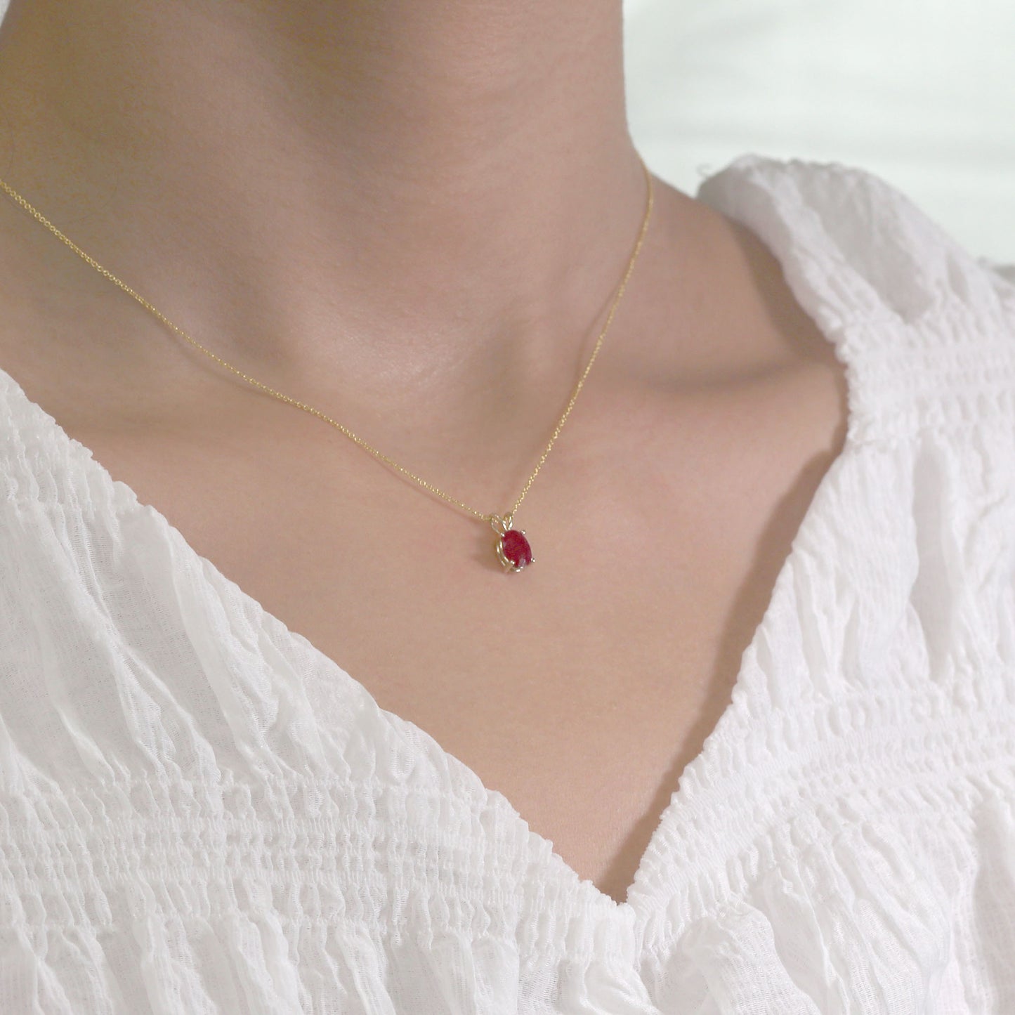 14K OVAL RUBY SOLITAIRE NECKLACE