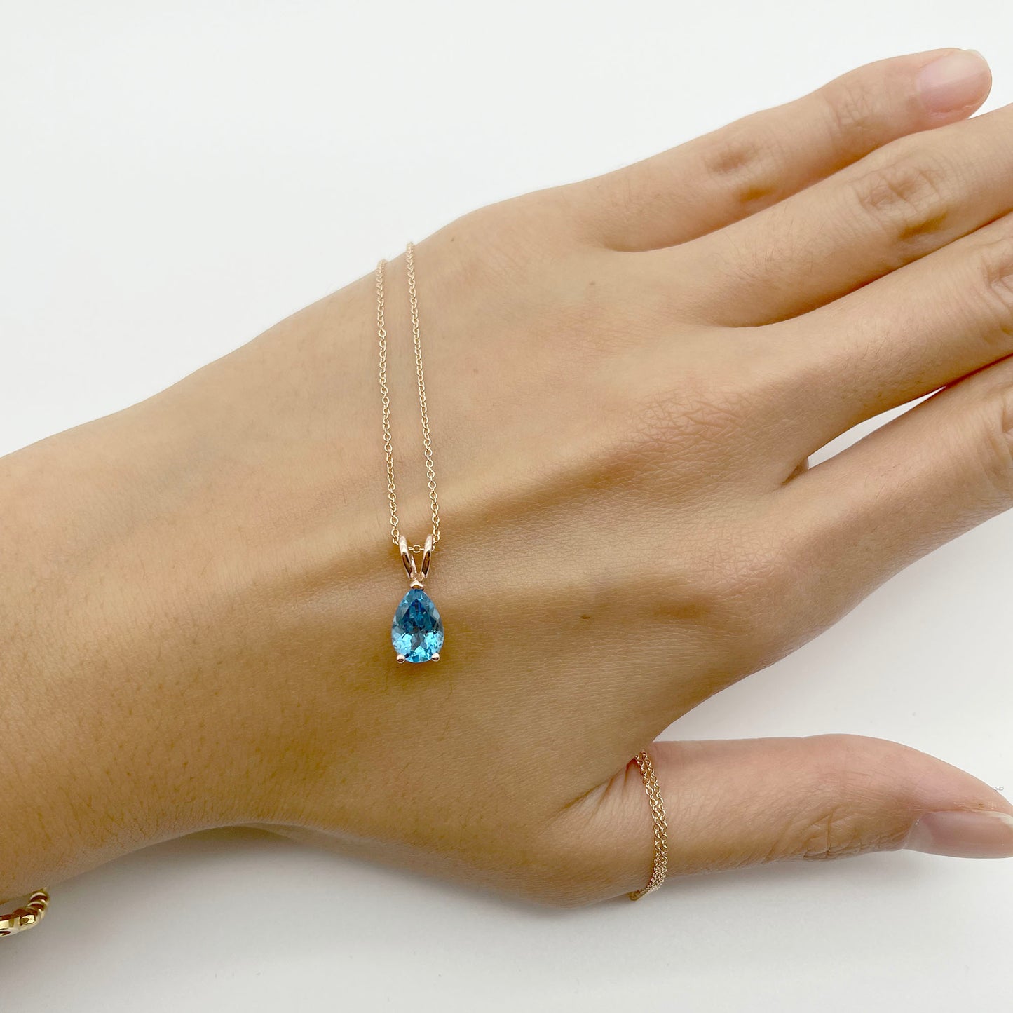 14K PEAR BLUE TOPAZ SOLITAIRE NECKLACE