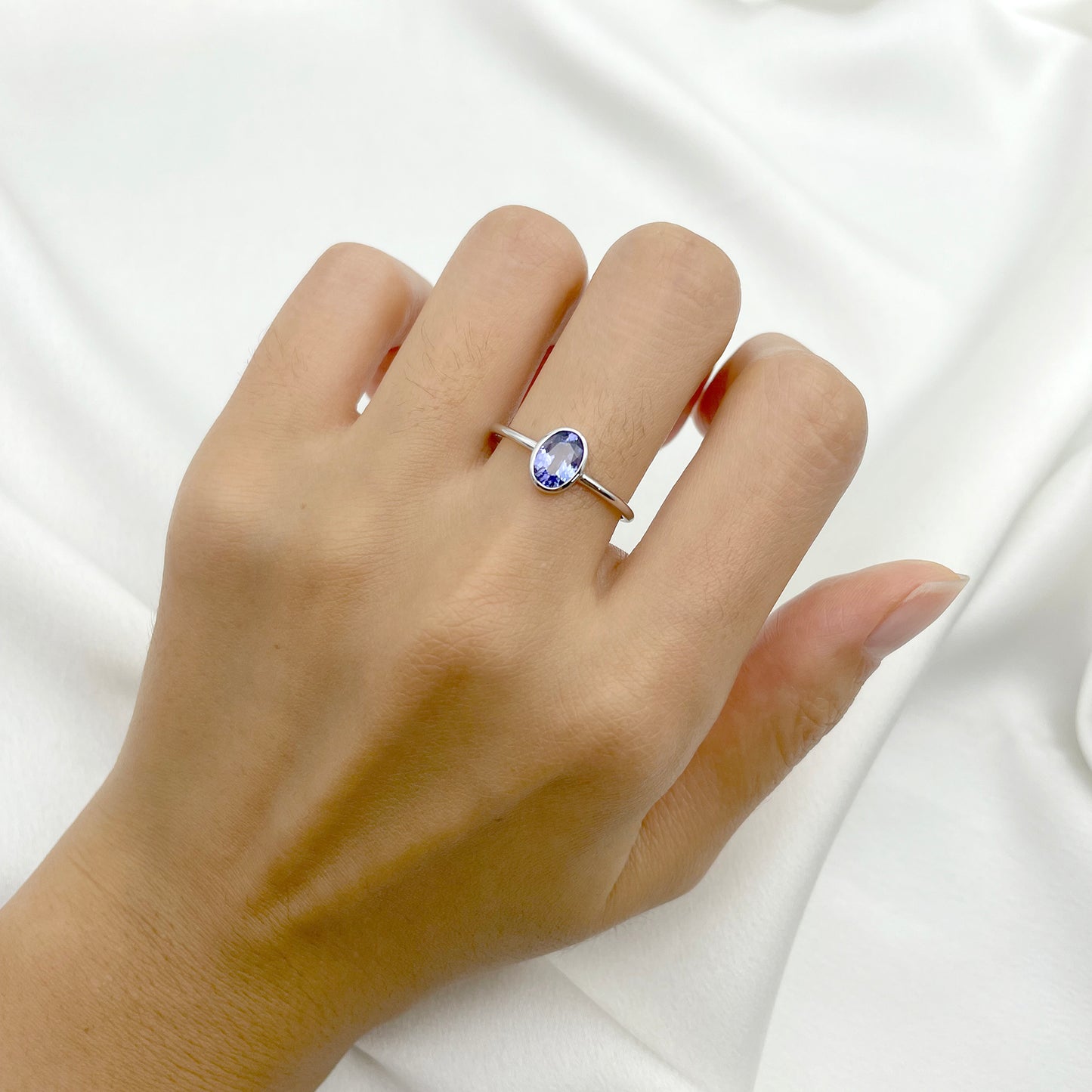 14K OVAL TANZANITE BEZEL SOLITAIRE RING