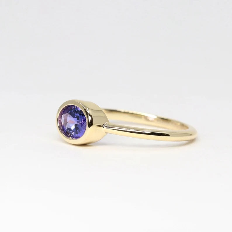 14K OVAL TANZANITE BEZEL RING