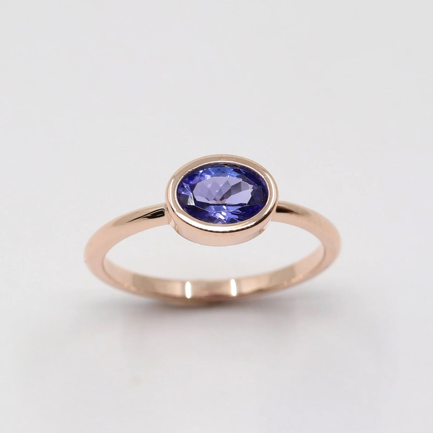 14K OVAL TANZANITE BEZEL RING