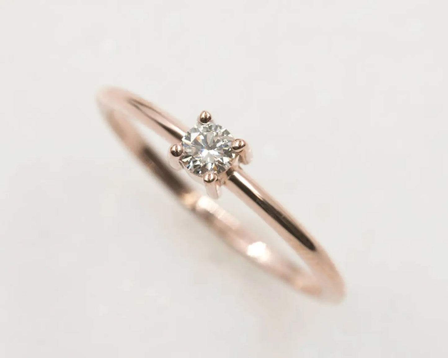 14K 0.15CT DIAMOND SOLITAIRE RING