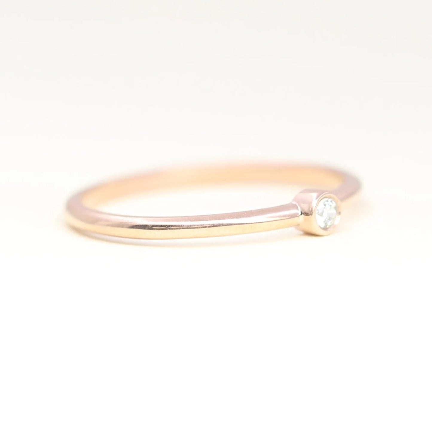 14K 0.03CT DIAMOND BEZEL SOLITAIRE RING