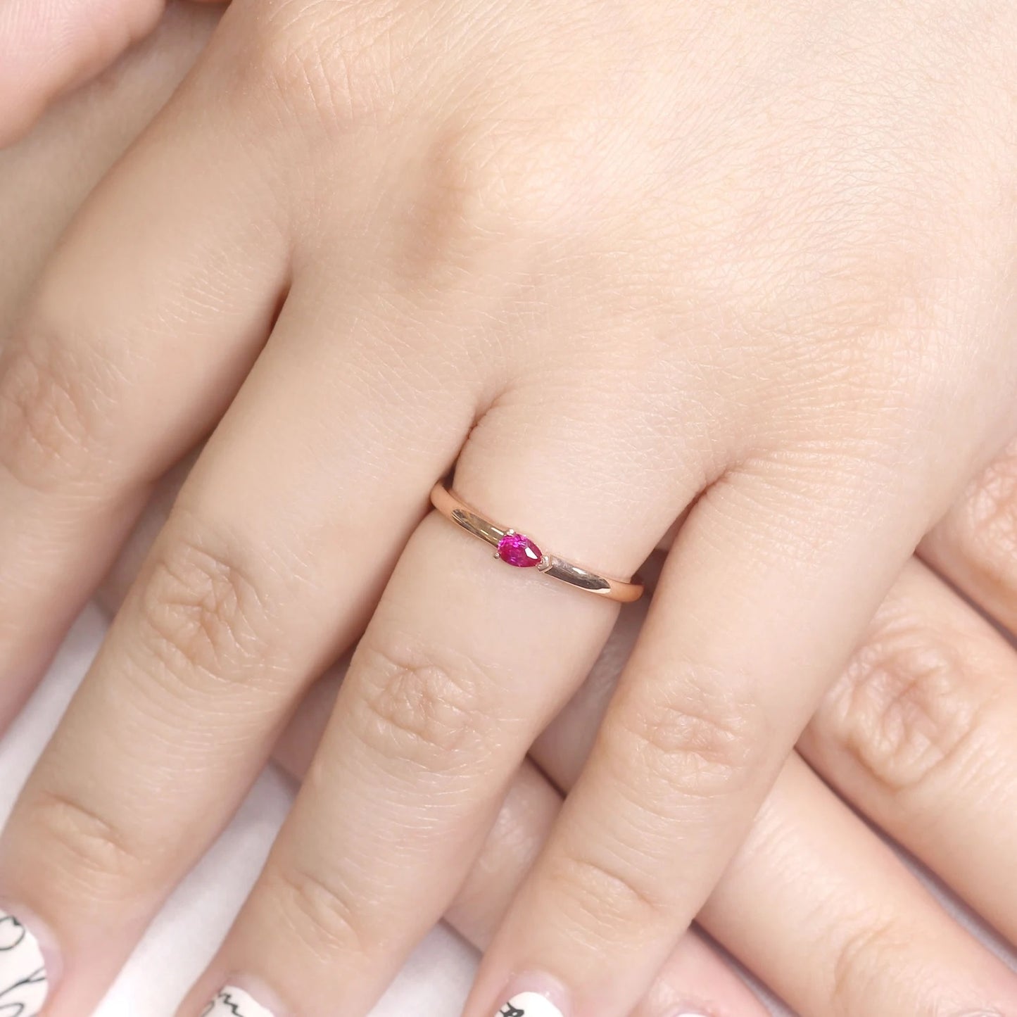 14K PEAR RUBY SOLITAIRE BAND