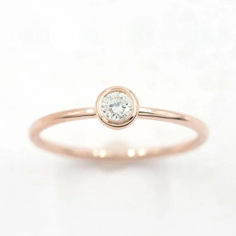14K 0.12CT DIAMOND BEZEL SOLITAIRE RING