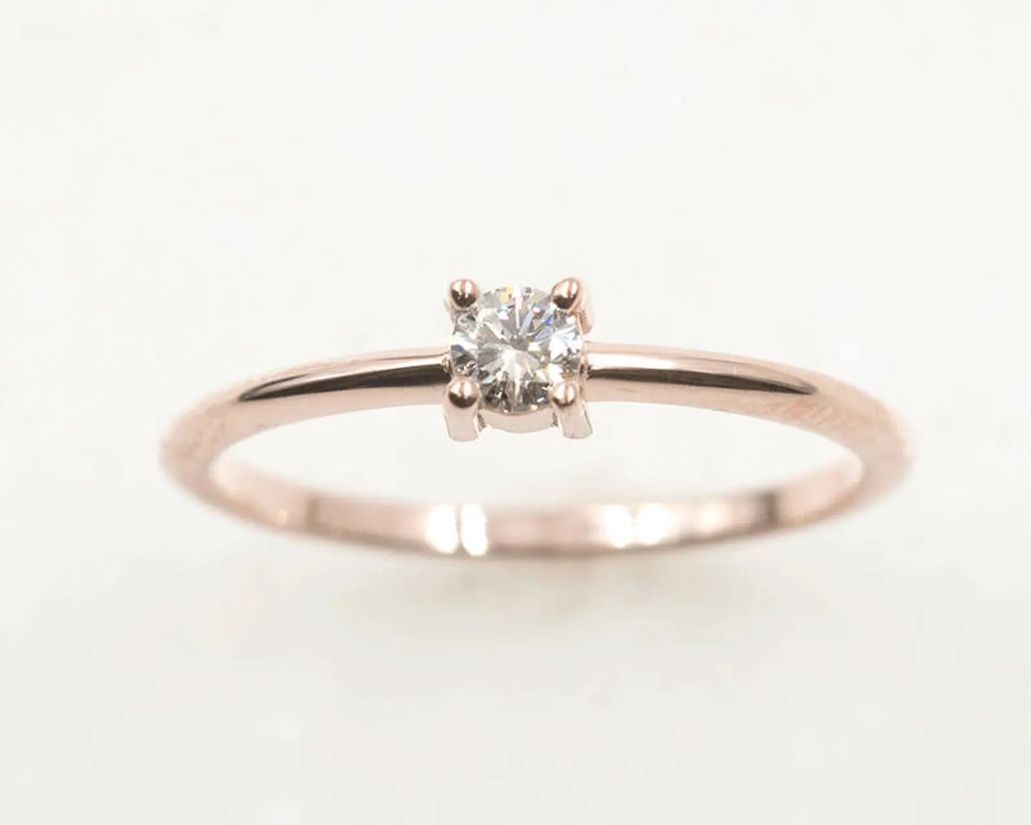 14K 0.15CT DIAMOND SOLITAIRE RING
