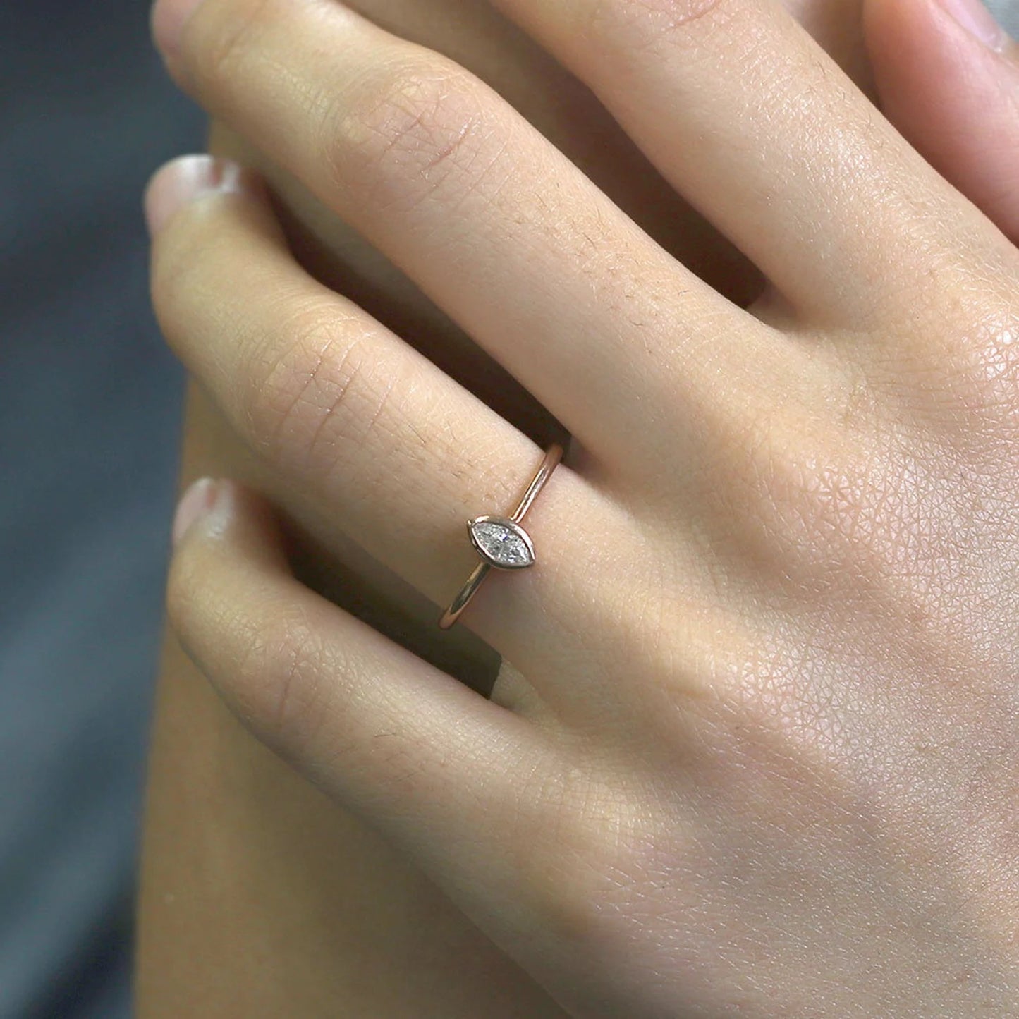 14K 0.15CT MARQUISE DIAMOND BEZEL SOLITAIRE RING
