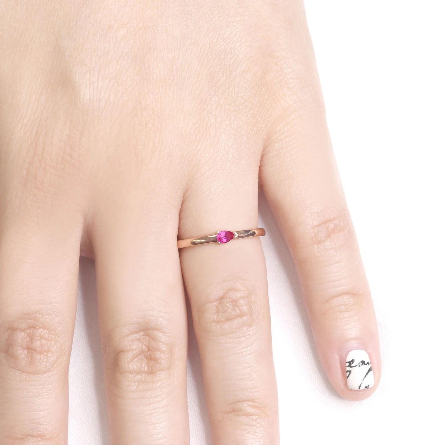 14K PEAR RUBY SOLITAIRE BAND
