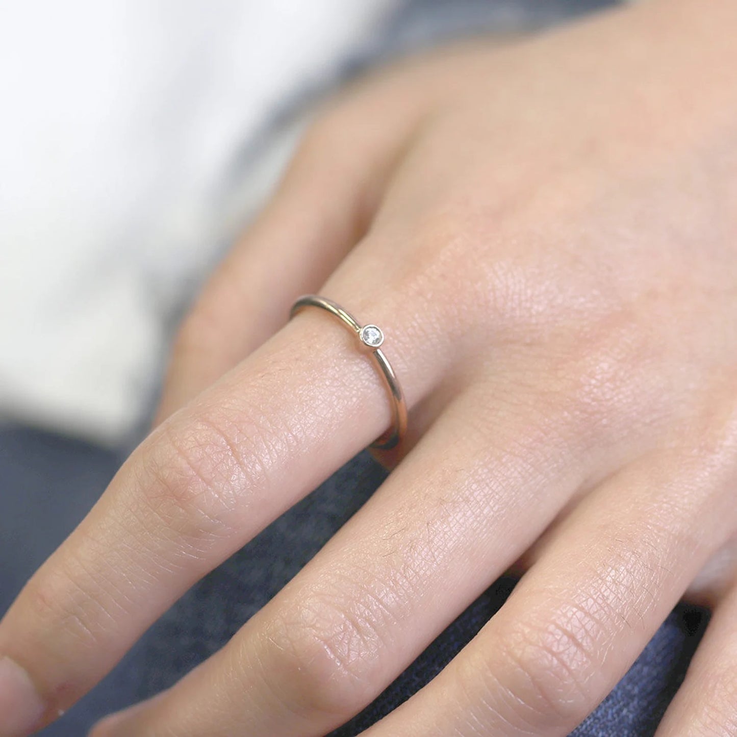 14K 0.03CT DIAMOND BEZEL SOLITAIRE RING