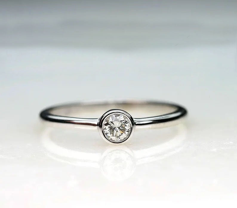 14K 0.12CT DIAMOND BEZEL SOLITAIRE RING