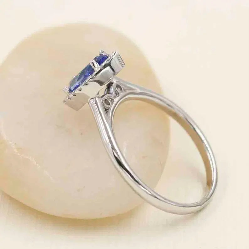 14K MARQUISE TANZANITE DIAMOND HALO RING