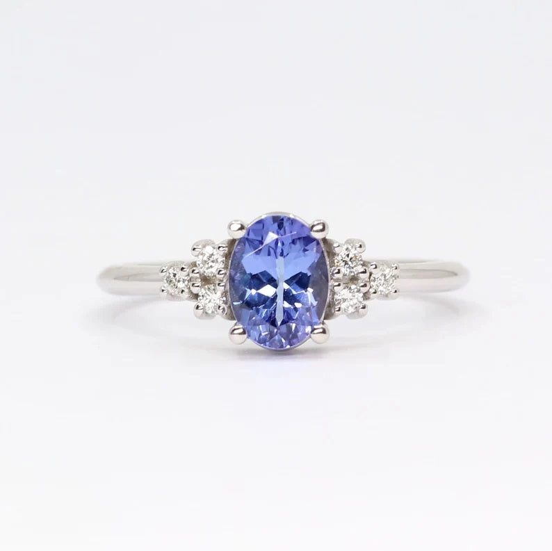 14K OVAL TANZANITE DIAMOND CLUSTER RING