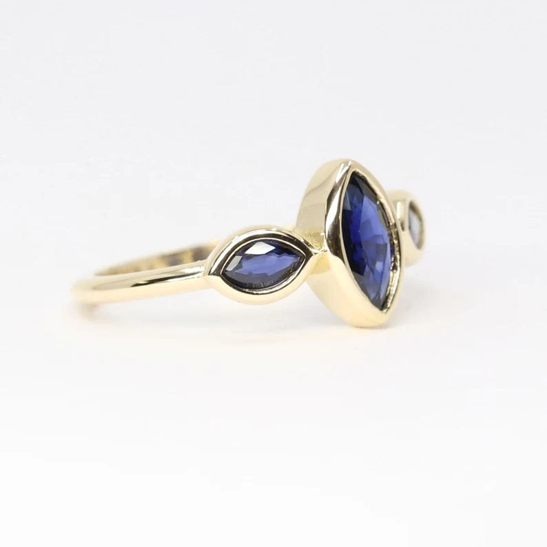 14K 3 MARQUISE SAPPHIRE BEZEL RING