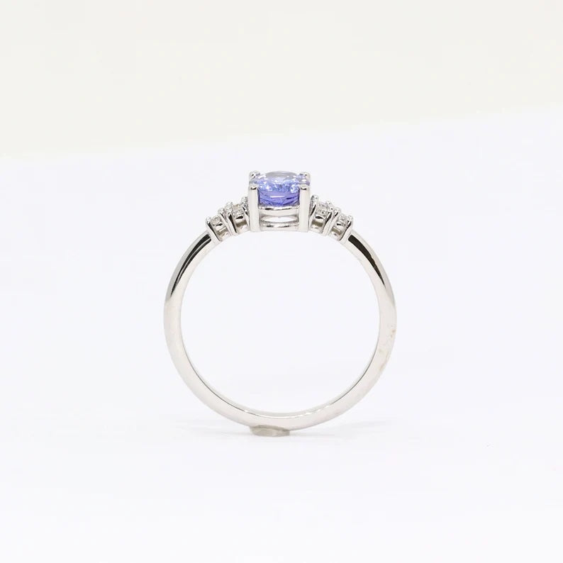 14K OVAL TANZANITE DIAMOND CLUSTER RING