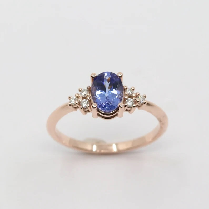 14K OVAL TANZANITE DIAMOND CLUSTER RING