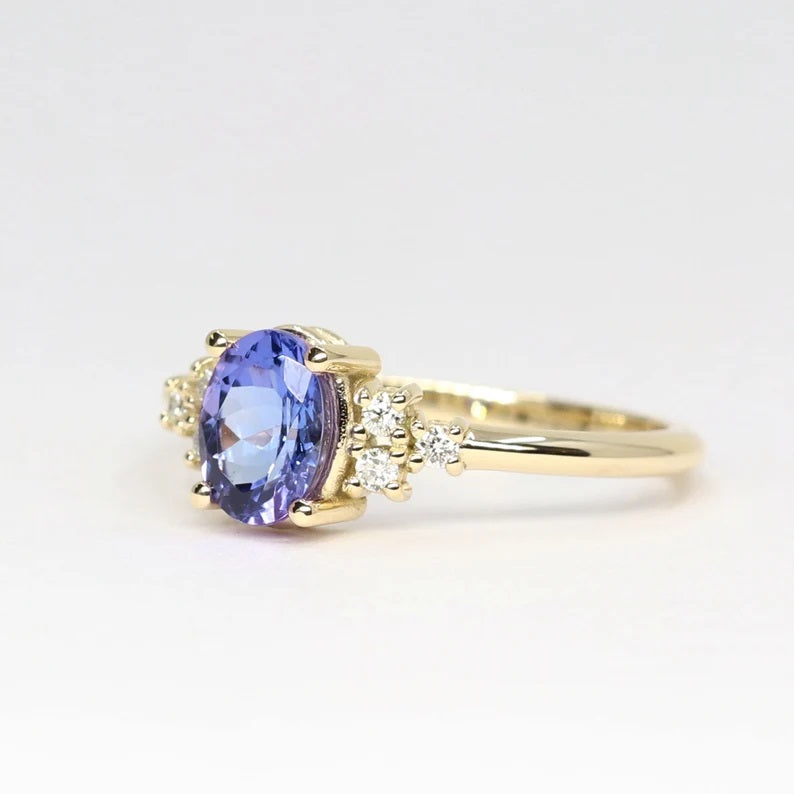 14K OVAL TANZANITE DIAMOND CLUSTER RING