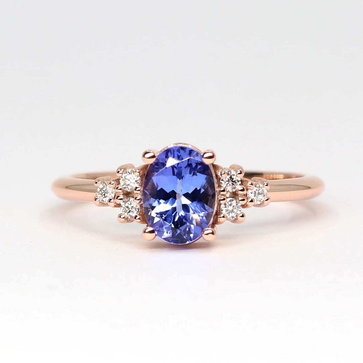 14K OVAL TANZANITE DIAMOND CLUSTER RING