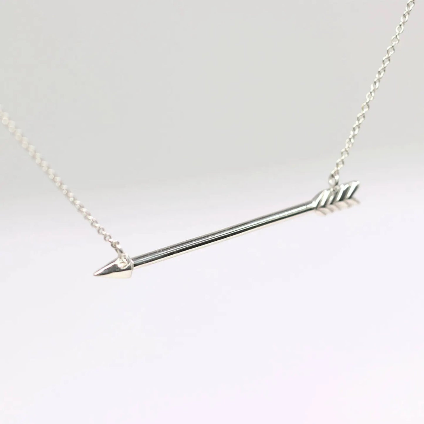 14K 1 DIAMOND SIDEWAYS ARROW NECKLACE