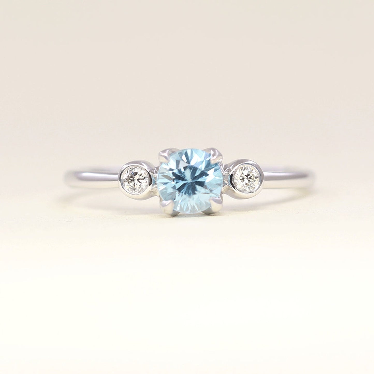 14K BLUE ZIRCON DIAMOND BEZEL RING