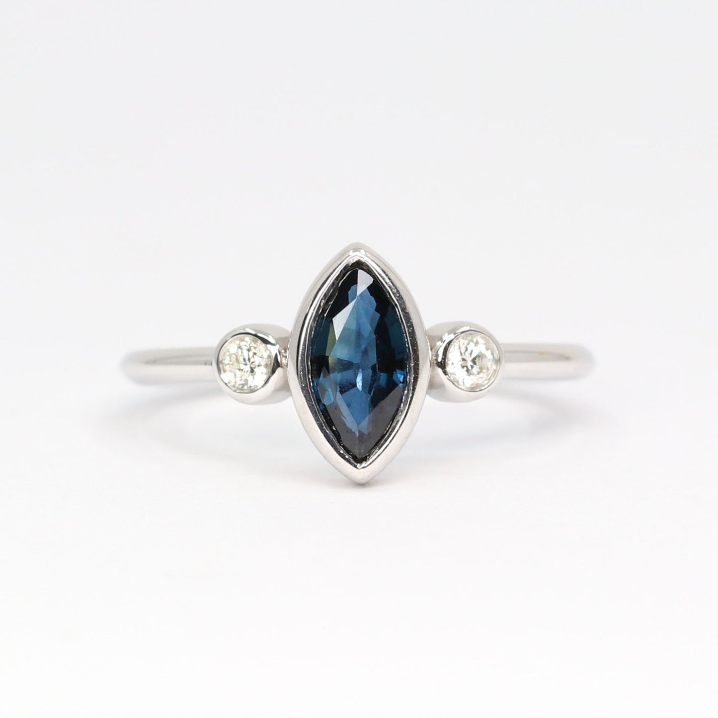 14K MARQUISE SAPPHIRE DIAMOND BEZEL RING