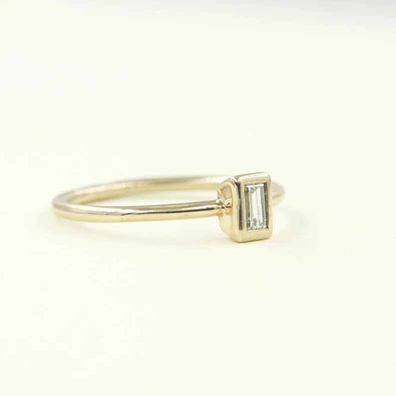 14K 0.15CT BAGUETTE DIAMOND BEZEL SOLITAIRE RING