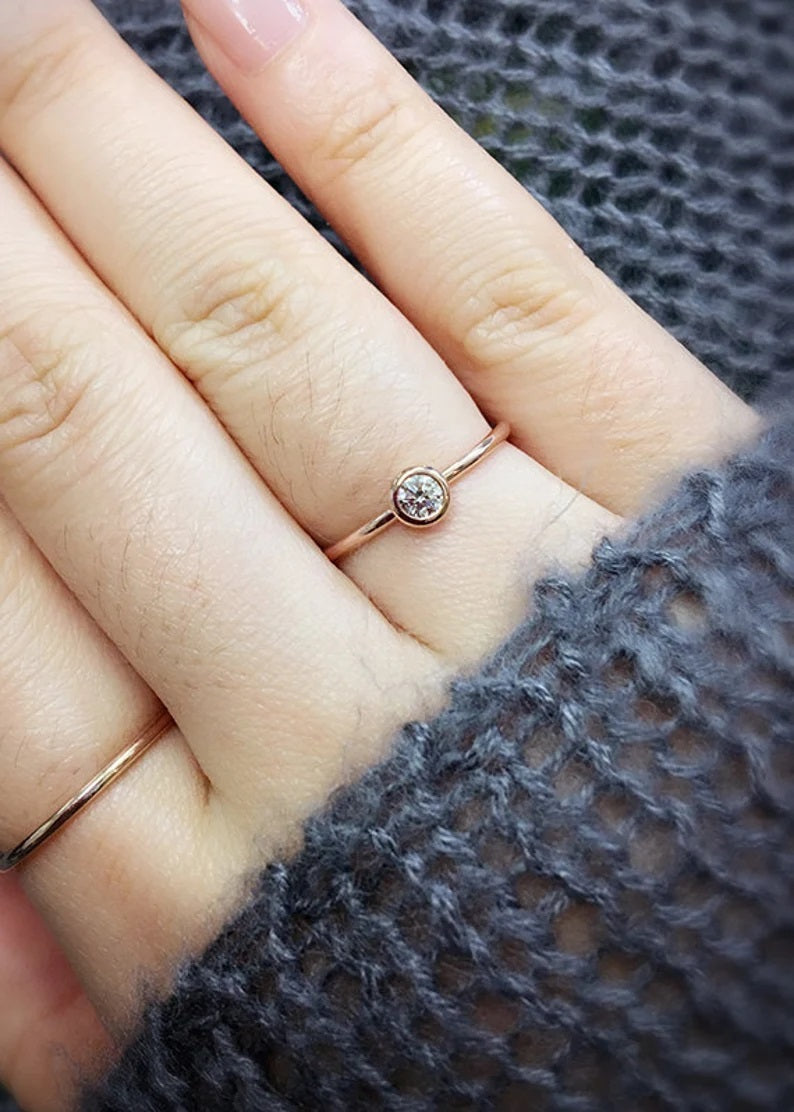 14K 0.12CT DIAMOND BEZEL SOLITAIRE RING