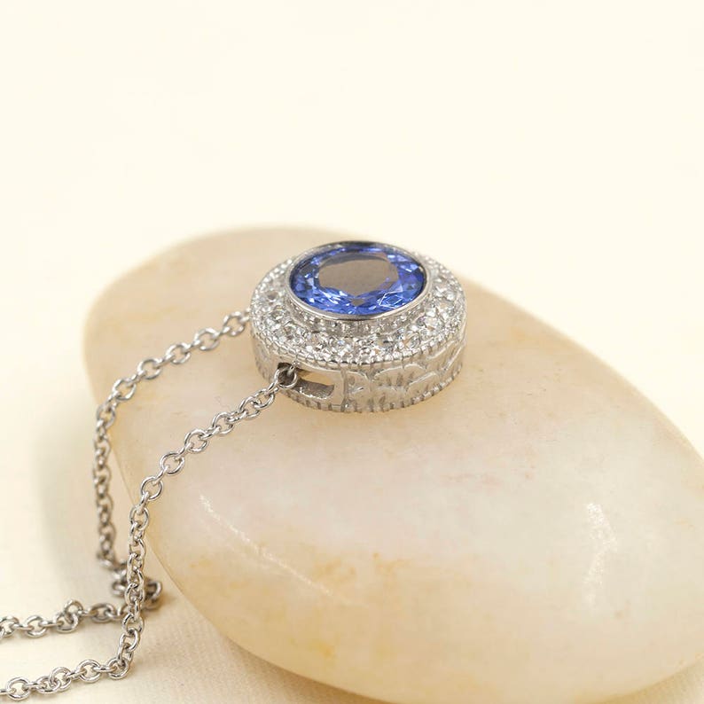 14K 1.3CT TANZANITE DIAMOND HALO NECKLACE