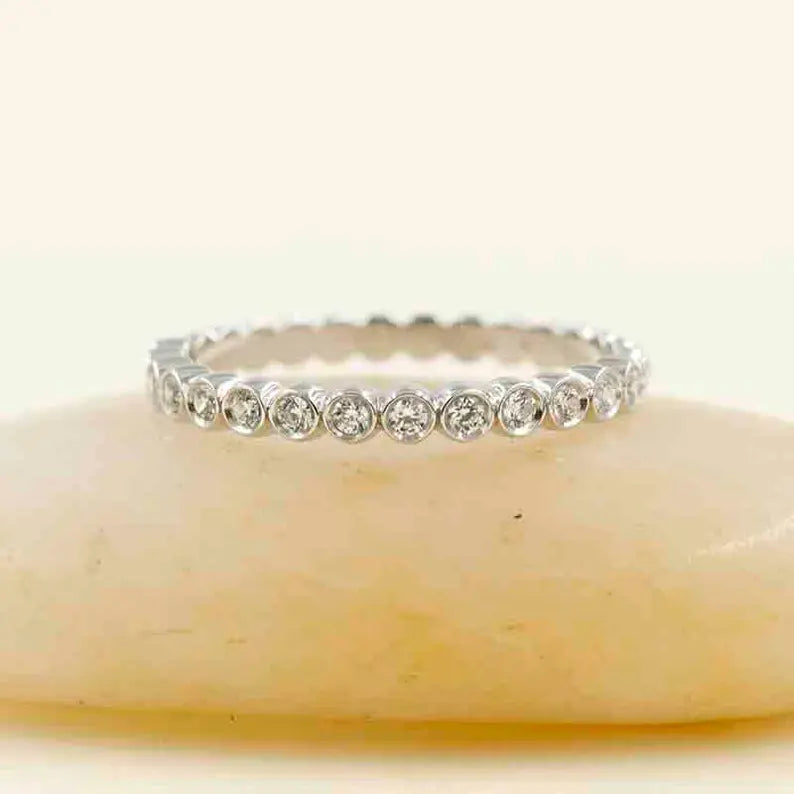 14K 0.23CT DIAMOND BEZEL BEADED BAND