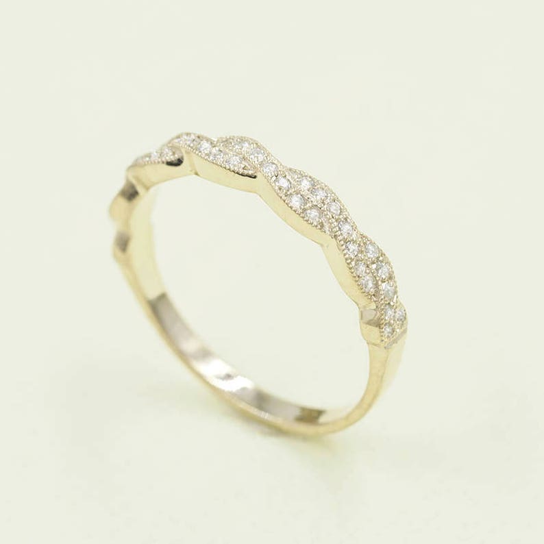 14K 0.21CT DIAMOND TWIST BAND