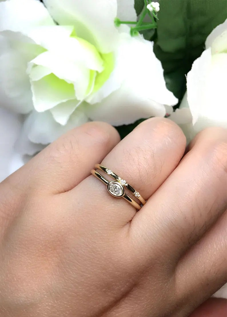 14K 0.15CT OVAL DIAMOND BEZEL SOLITAIRE RING