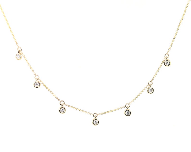 14K 7 DIAMOND BEZEL DANGLING NECKLACE