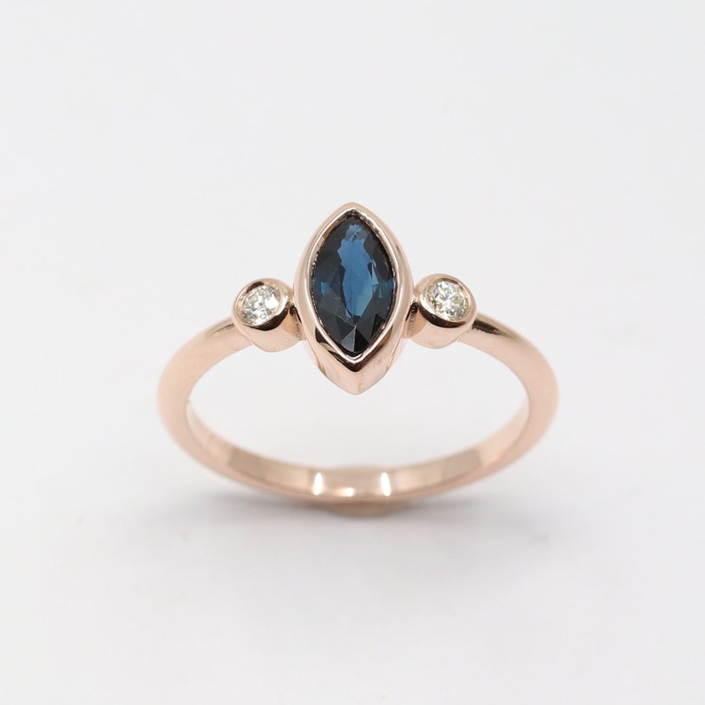 14K MARQUISE SAPPHIRE DIAMOND BEZEL RING