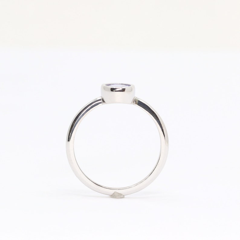 14K OVAL TANZANITE BEZEL SOLITAIRE RING