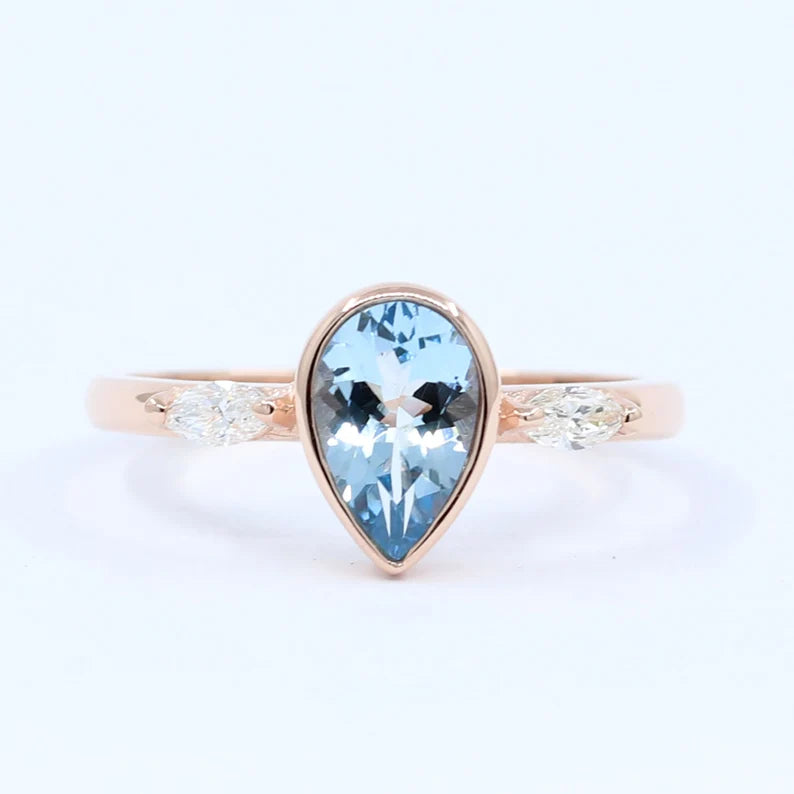 14K PEAR AQUAMARINE BEZEL MARQUISE DIAMOND RING