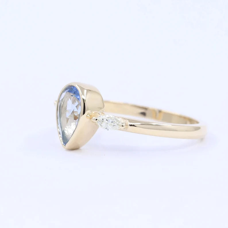 14K PEAR AQUAMARINE BEZEL MARQUISE DIAMOND RING
