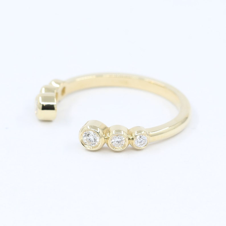 14K 0.20CT DIAMOND BEZEL OPEN BAND
