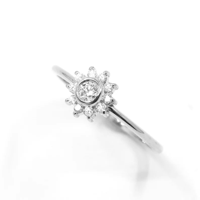 14K DIAMOND BEZEL FLOWER RING