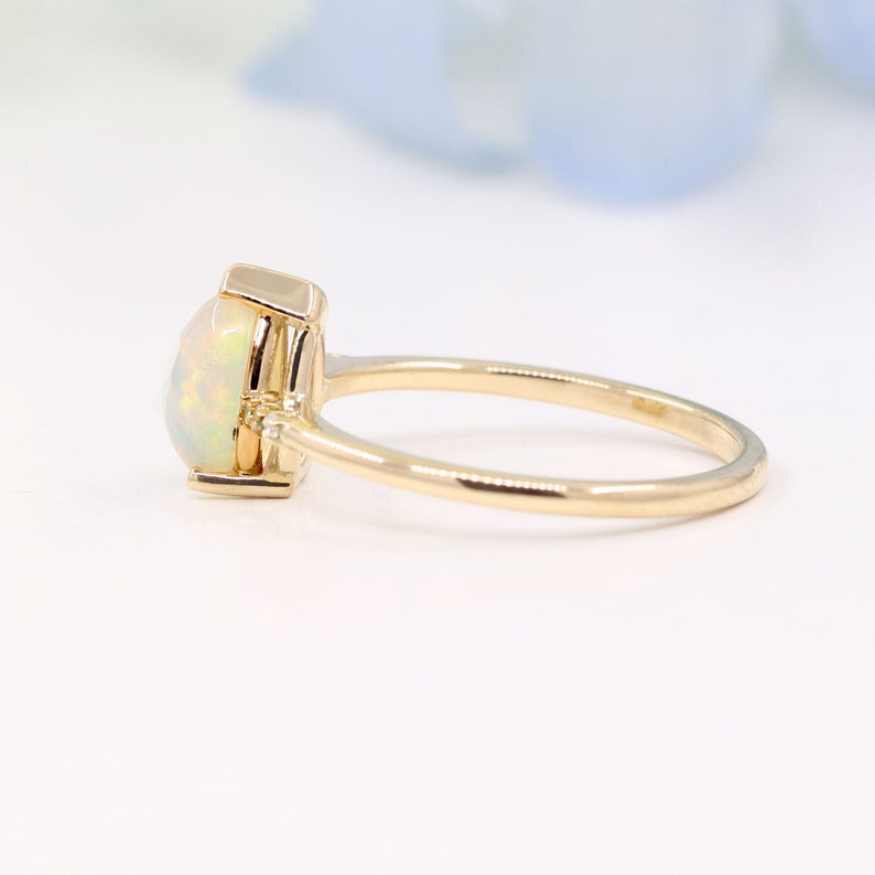 14K PEAR OPAL DIAMOND SOLITAIRE RING