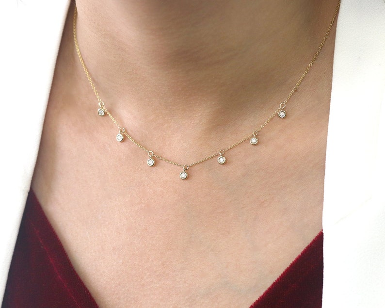 14K 7 DIAMOND BEZEL DANGLING NECKLACE