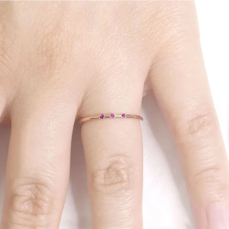 14K 3 RUBY SPACED 1.2MM BAND