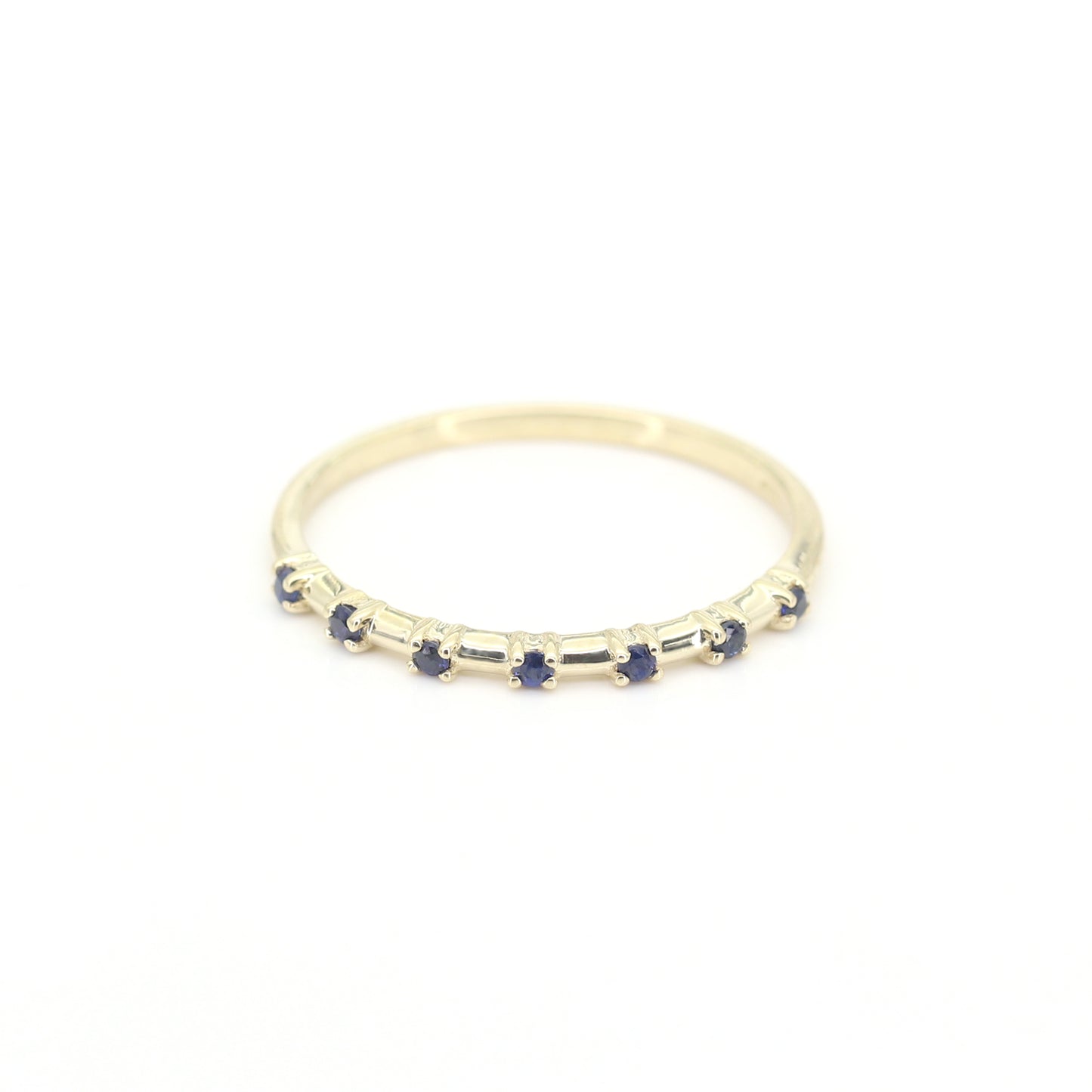 14K 7 SAPPHIRE SPACED 1.2MM BAND