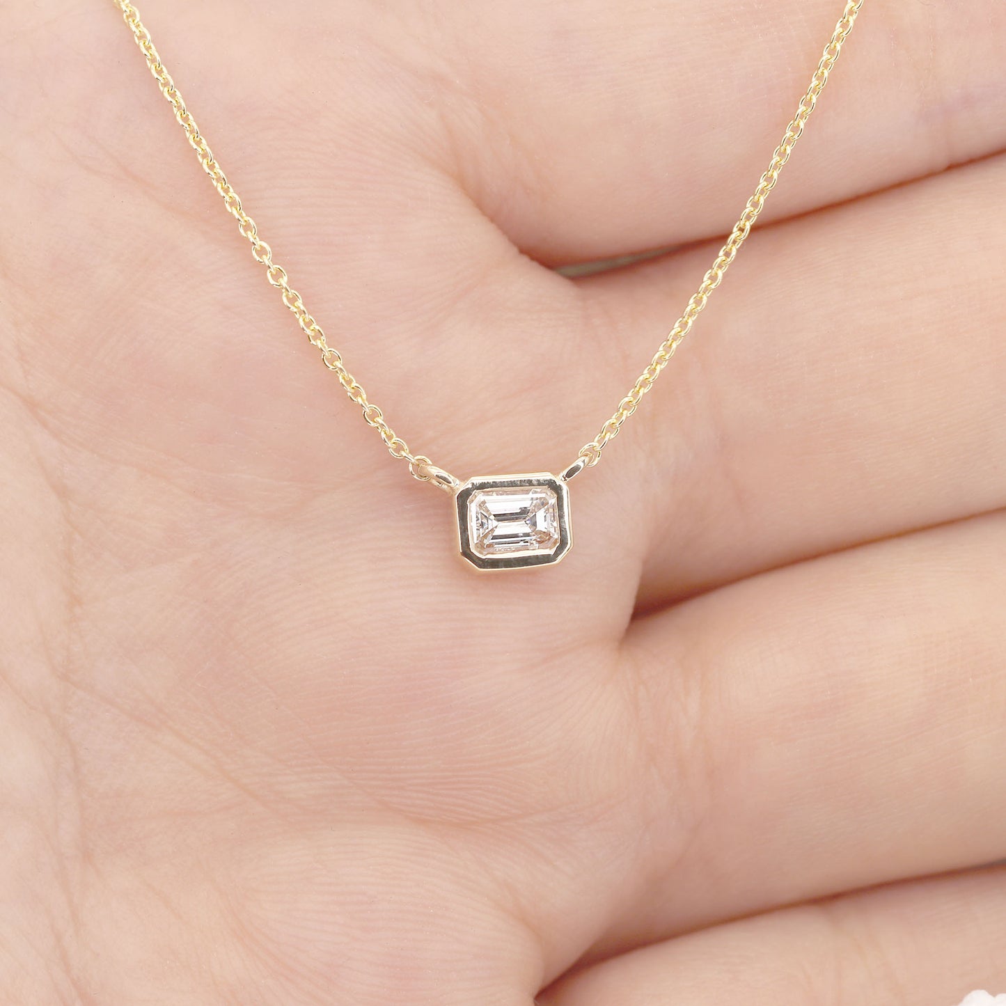 14K 0.25CT EMERALD CUT DIAMOND BEZEL NECKLACE