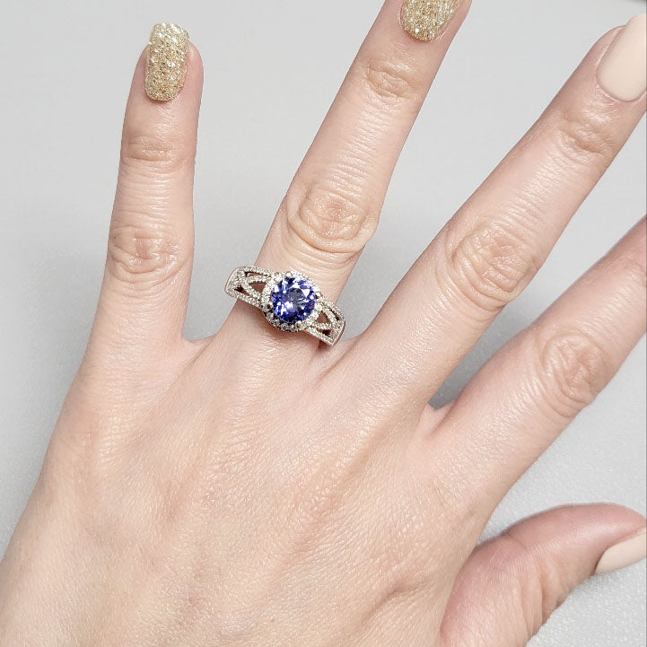 18K WHITE GOLD TANZANITE DIAMOND HALO RING